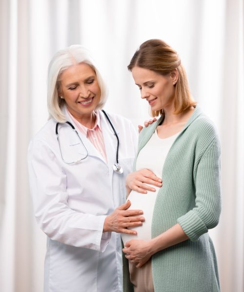 doctor-examining-young-pregnant-woman-during-medical-consultation.jpg